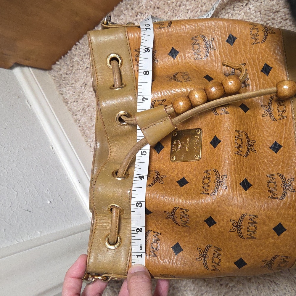 Authentic MCM Visetos Coated Canvas Heritage
Drawstring Bucket Bag Cogna… - Picture 13 of 15